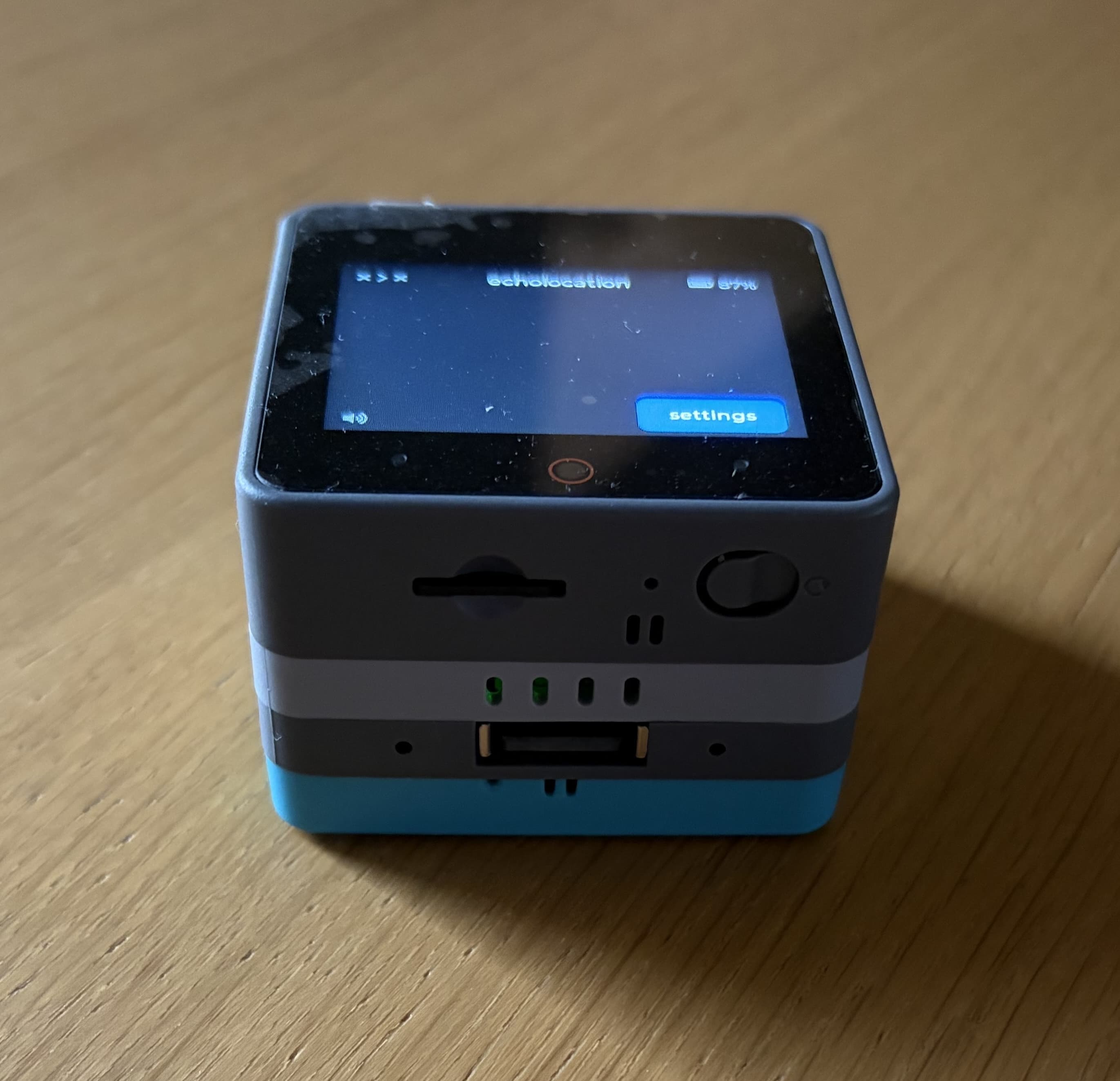 Front of echolocation showing the reset button next to the microSD slot
