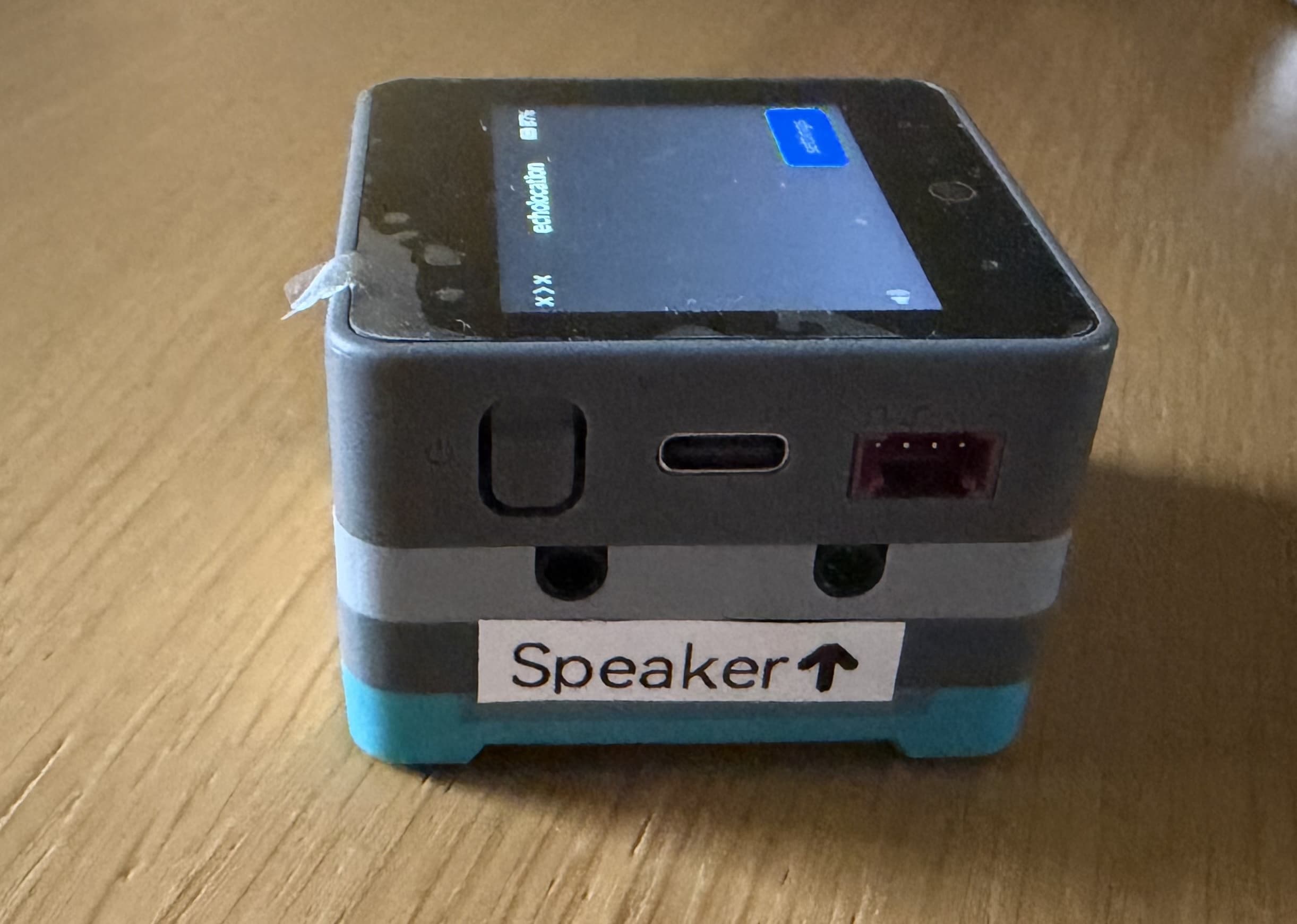 Side of echolocation showing the power button and USB-C charging port